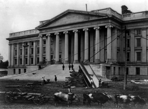 Construction of Treasury Building, Washington, D.C. With oxen in foreground on south side