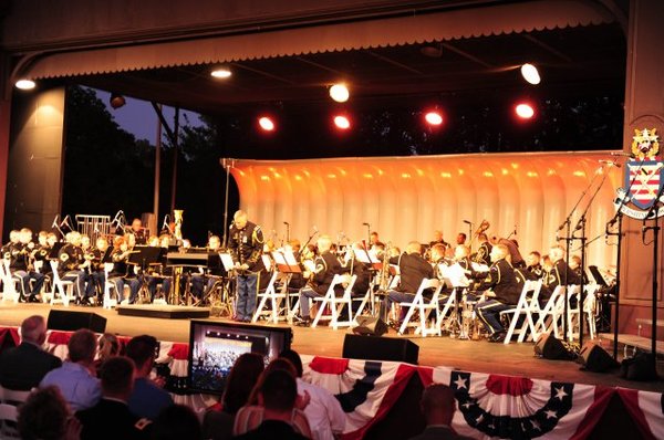 Lt. Col. Andrew Esch, Deputy Commander, The U.S. Army Band Pershing\'s Own takes a bow between selections at the Overture 1812 Concert, Aug. 16, 2011 at the Sylvan Theater. Army Website..jpg