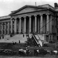 Construction of Treasury Building, Washington, D.C. With oxen in foreground on south side